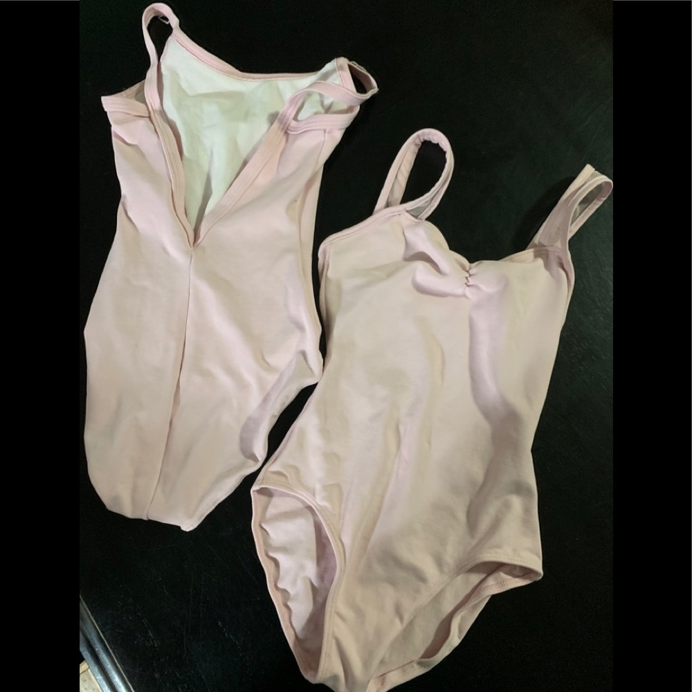 2 pink leotards